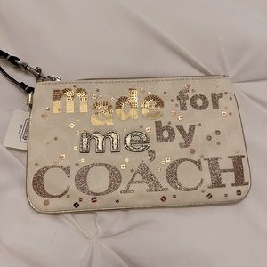 Brand new Coach wristlet